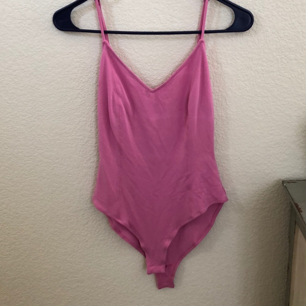 Pink body suit